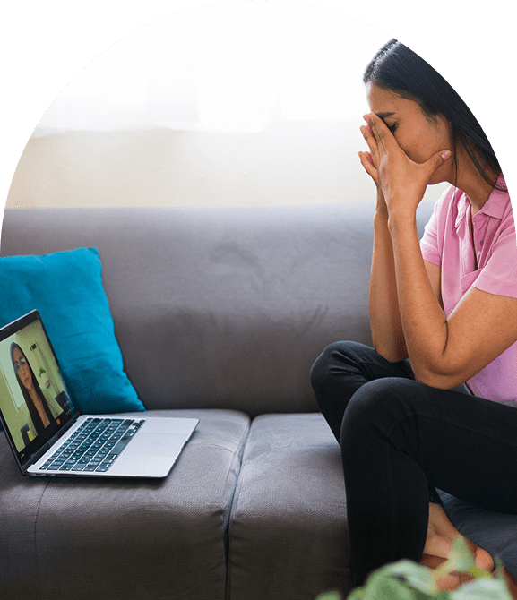 Woman upset during a video call.