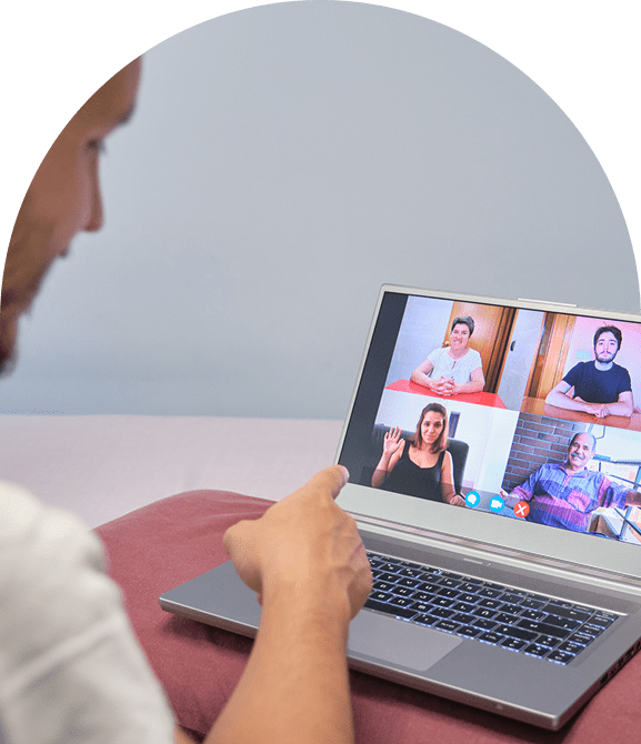 Person participating in a video conference call.
